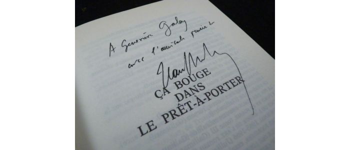 DUTOURD : Ca bouge dans le prêt-à-porter - Signed book, First edition - Edition-Originale.com